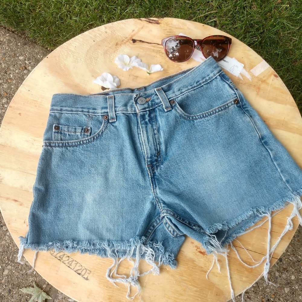 Levi's 577 distressed  cut off shorts size 4
